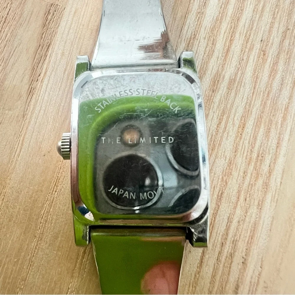 The limited ladies rectangular silver tone bracelet watch NEW BATTERY